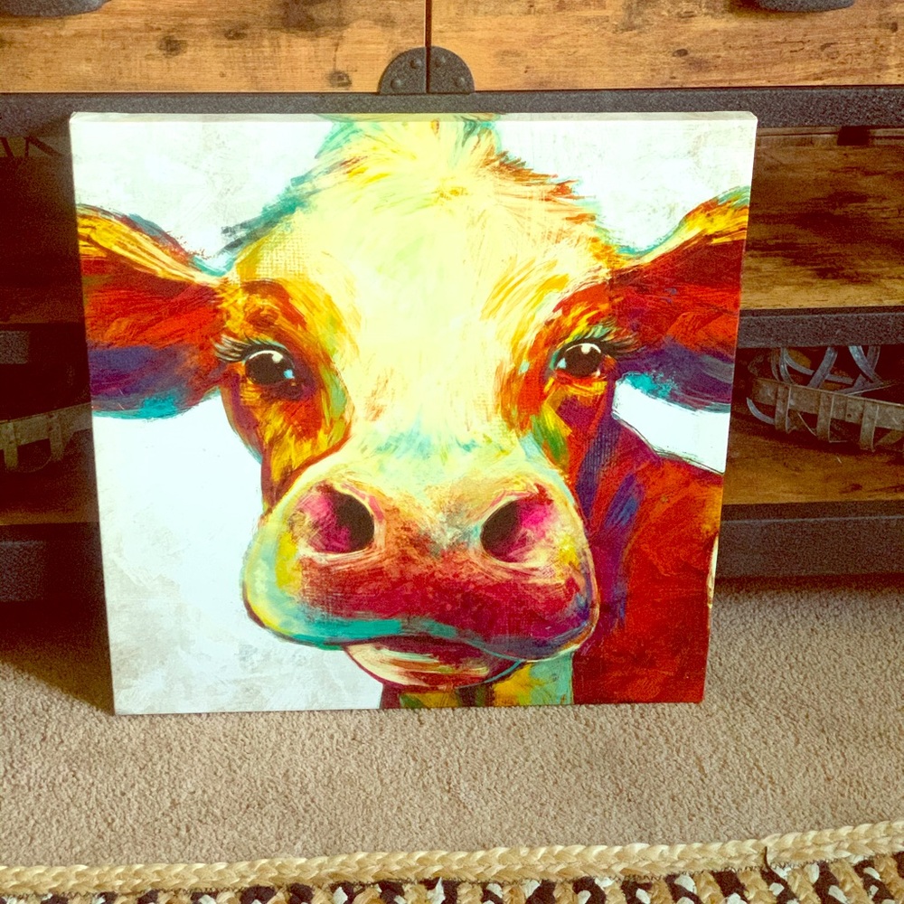 Beautiful cow stretched canvas with hanger back.